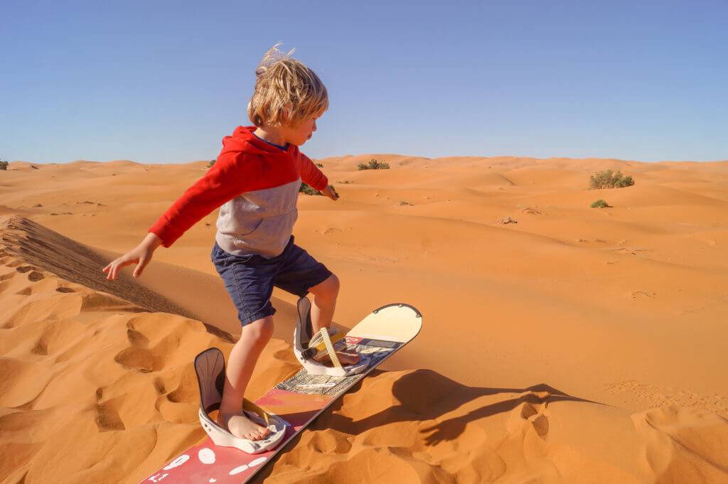 Sahara_sandboarding_boy-1024x681