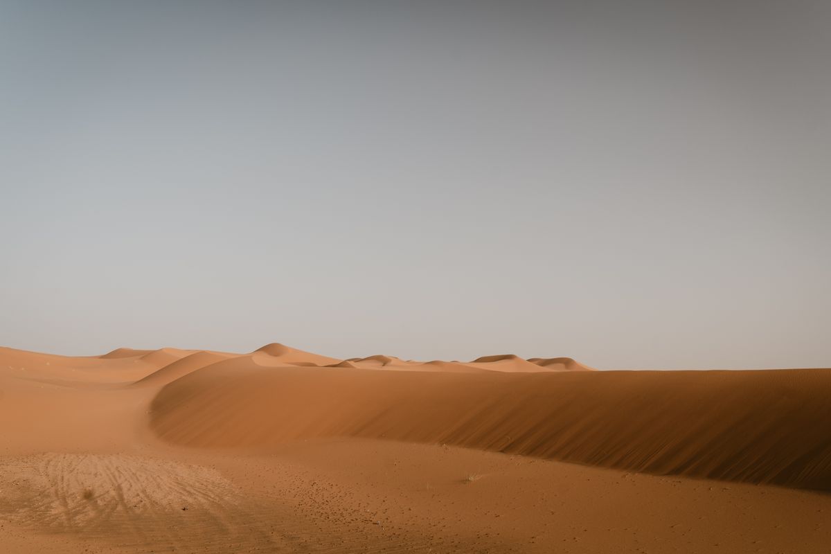 Vast sand dunes in Merzouga, Morocco's famous Sahara Desert gateway